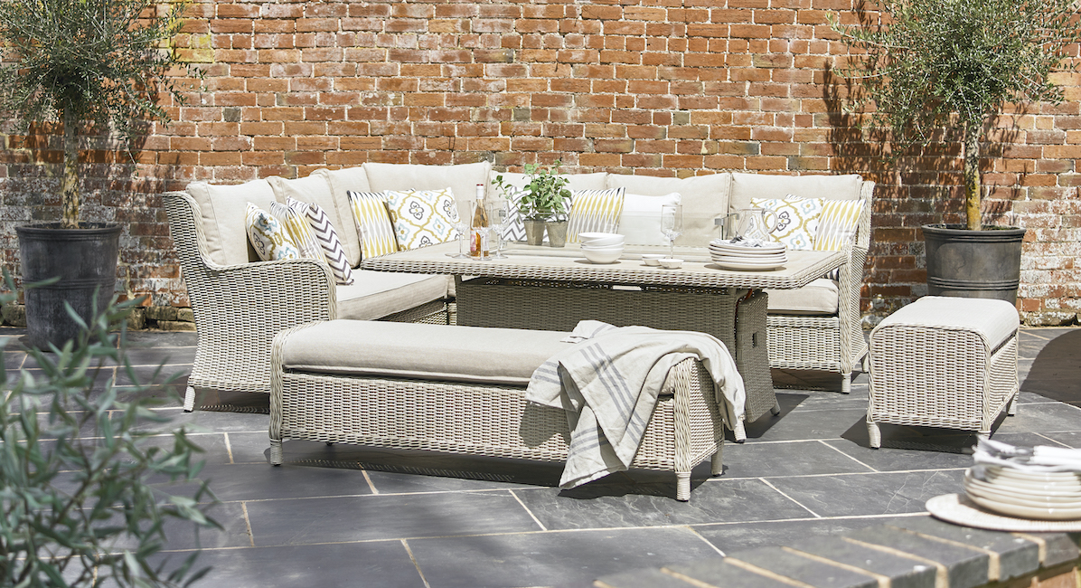 Chedworth outdoor wicker fire pit table dining set